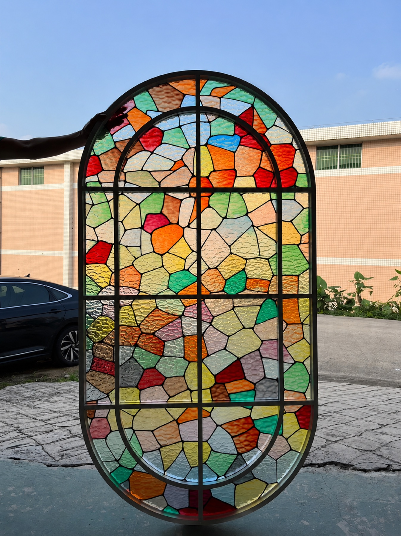 Large colourful stained glass arched panel